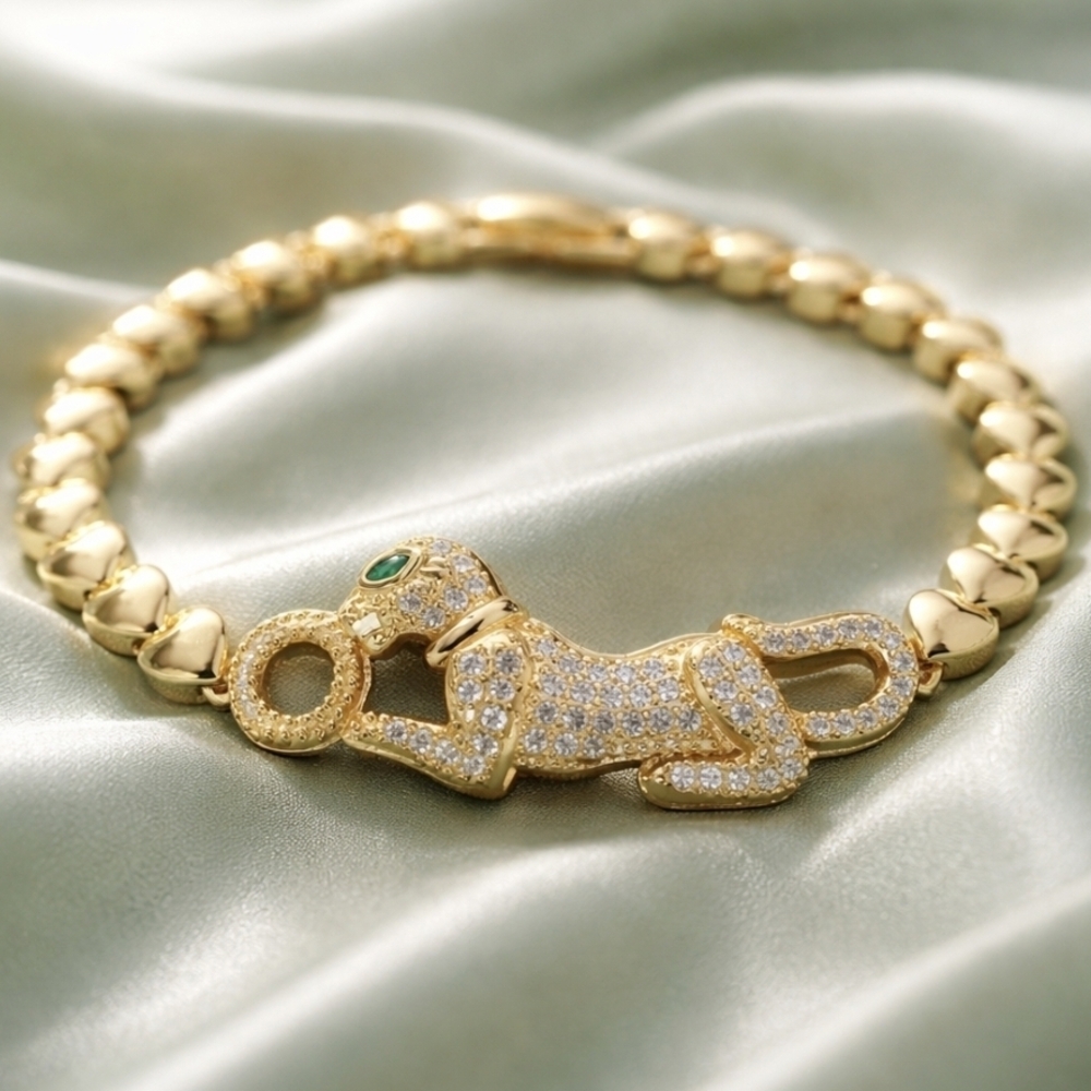 Gold Paved Panther Chain Bracelet with Green Eye Accent